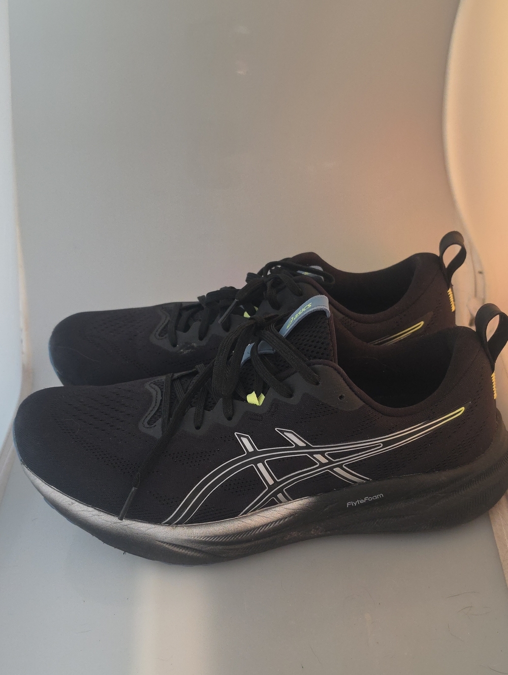 ASICS Gel Pulse 16 Black Athletic Running Shoes with Silver Logo Accents